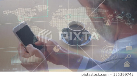 Holding smartphone senior executive analyzing data at wooden desk, with coffee and digital graphics Holding smartphone senior executive analyzing data at wooden desk, with coffee and digital graphics 135399742