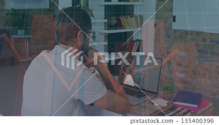 Watching adult man viewing female colleague on laptop in home office, with potted plant, copy space 135400396