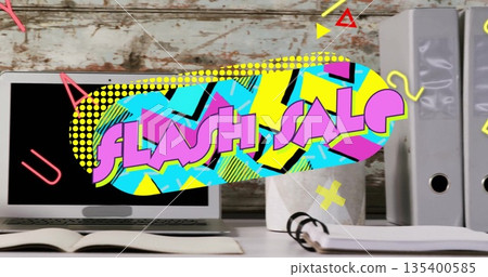 Displaying FLASH SALE graphic overlay over wooden desk area, featuring laptop and notebook 135400585