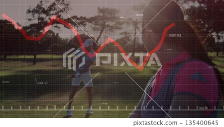 Standing female golfer holding club at golf course fairway, with line graph overlay, copy space Standing female golfer holding club at golf course fairway, with line graph overlay, copy space 135400645