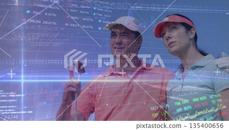 Standing couple wearing golf attire on fairway, holding club and glove with financial overlay Standing couple wearing golf attire on fairway, holding club and glove with financial overlay 135400656