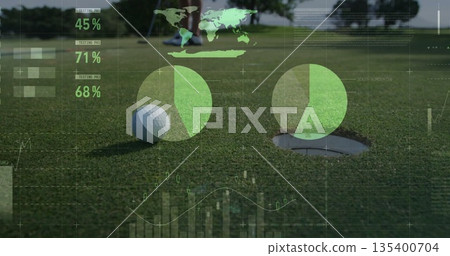 Resting white golf ball sitting on trimmed putting green, with golf shoes and data overlay graphics 135400704