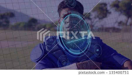 Standing adult male catcher wearing blue chest protector at baseball field, with biometric HUD Standing adult male catcher wearing blue chest protector at baseball field, with biometric HUD 135400751