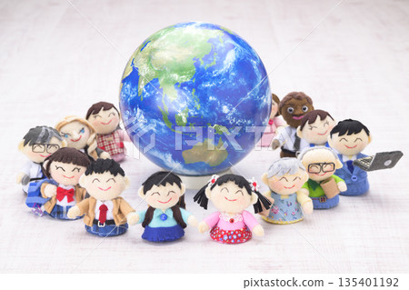 People holding hands around the earth People holding hands around the earth 135401192