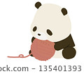 Panda holding a yarn 135401393