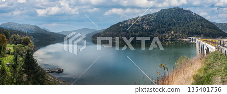 Peaceful Autumn Landscape Of Lake Izvorul Muntelui In Romanian Mountains Peaceful Autumn Landscape Of Lake Izvorul Muntelui In Romanian Mountains 135401756