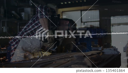 Grinding beam with angle grinder in workshop, craftsman wearing apron leather gloves safety glasses 135401864