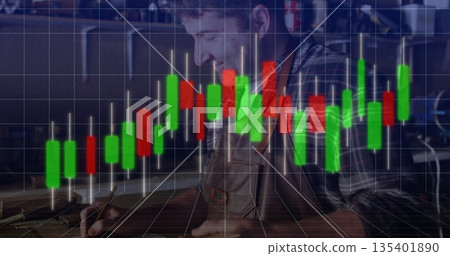 Sketching craftsman in leather apron at workshop bench, with pencil and candlestick chart overlay Sketching craftsman in leather apron at workshop bench, with pencil and candlestick chart overlay 135401890