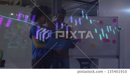 Reviewing blue folder, coworkers analyzing data at office with whiteboard, plant, chair and charts 135401910