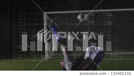 Executing bicycle kick soccer player sending ball toward goal on grass under lights, with analytics 135402130