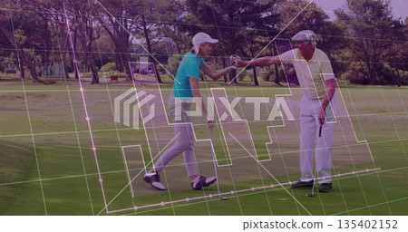 Exchanging fist bump, woman and man in golf attire celebrating putt at golf course with clubs Exchanging fist bump, woman and man in golf attire celebrating putt at golf course with clubs 135402152