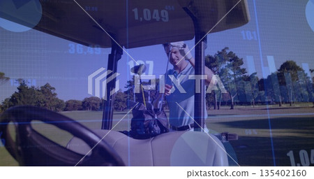 Golfer selecting club from golf bag beside golf cart on fairway, wearing polo and trousers Golfer selecting club from golf bag beside golf cart on fairway, wearing polo and trousers 135402160
