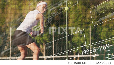 Swinging racket headband tennis player hitting ball over net on court, with overlays Swinging racket headband tennis player hitting ball over net on court, with overlays 135402244