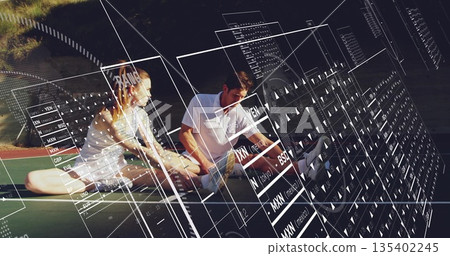 Fitness partners stretching on tennis court wearing sportswear, with digital HUD panels 135402245