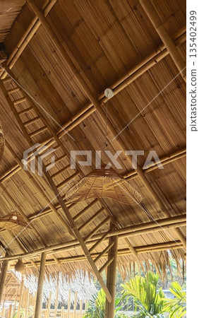 Decorative lamp crafted from bamboo with warm glow 135402499