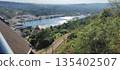High viewpoint overlooking river and surrounding residential houses 135402507