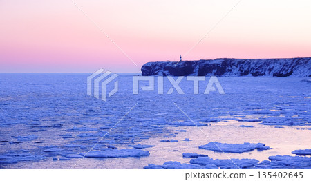 Drift ice floating in the morning glow at Cape Notoro in Abashiri, Hokkaido in mid-winter Drift ice floating in the morning glow at Cape Notoro in Abashiri, Hokkaido in mid-winter 135402645