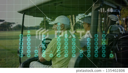 Turning golfers wearing polos gripping wheel on golf cart, viewing data overlay on path, with clubs 135402806