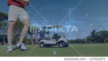 Male golfer aligning club and ball on fairway near golf cart, with digital HUD, copy space Male golfer aligning club and ball on fairway near golf cart, with digital HUD, copy space 135402872