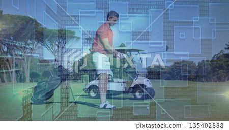 Golfer wearing red polo, shorts, cap maneuvering golf cart on fairway, with digital interface 135402888