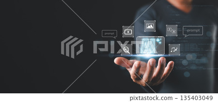 person hold a glowing AI interface in their palm surrounded by icons for video,image,translation,music,and prompts,representing artificial intelligence capabilities in multimedia and content creation. person hold a glowing AI interface in their palm surrounded by icons for video,image,translation,music,and prompts,representing artificial intelligence capabilities in multimedia and content creation. 135403049