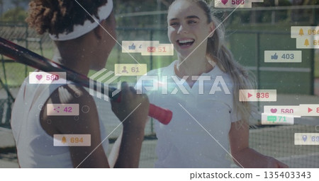Smiling woman in white polo chatting with partner on tennis court, notification icons, copy space Smiling woman in white polo chatting with partner on tennis court, notification icons, copy space 135403343