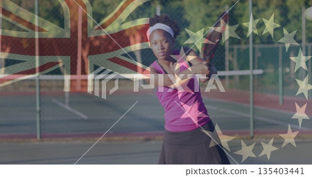 Swinging female tennis player hitting backhand on court with net, British flag and EU stars overlay Swinging female tennis player hitting backhand on court with net, British flag and EU stars overlay 135403441