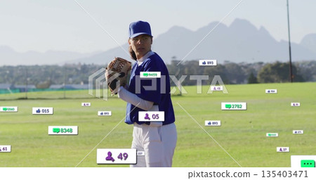 Standing female baseball player holding glove pitching on baseball field, with digital overlays Standing female baseball player holding glove pitching on baseball field, with digital overlays 135403471
