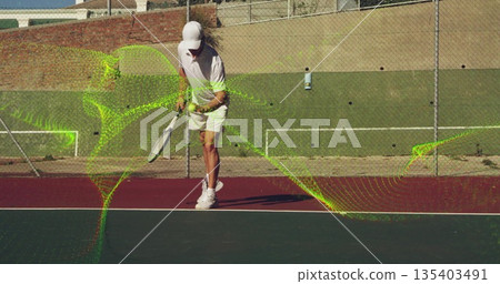 Swinging middle-aged tennis player wearing white outfit on hardcourt with racket and green overlay Swinging middle-aged tennis player wearing white outfit on hardcourt with racket and green overlay 135403491