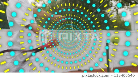 Swinging adult male tennis player hitting ball with racket on outdoor court, with digital overlay Swinging adult male tennis player hitting ball with racket on outdoor court, with digital overlay 135403540