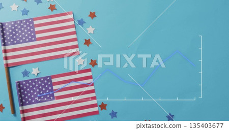 Displaying two American flags on sticks lying on tabletop, with confetti, line chart, copy space 135403677