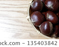A photo of chestnuts on a desk 135403842