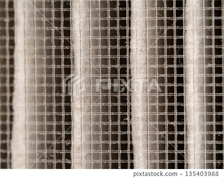 Surface of nylon mesh and filter paper in the dust filter Surface of nylon mesh and filter paper in the dust filter 135403988