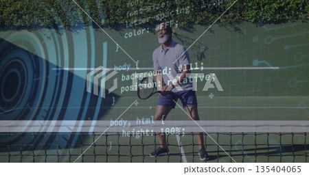 Waiting man wearing polo shirt holding racket on tennis court near net, with digital code graphic 135404065