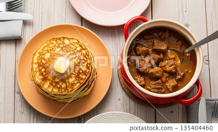 stack of pancakes on black background stack of pancakes on black background 135404460