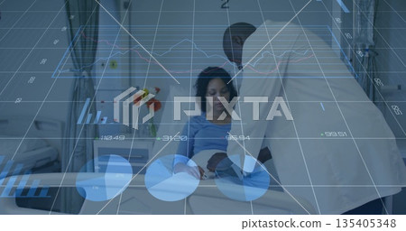 Reviewing doctor in lab coat holding clipboard beside bed, observing patient with chart overlay 135405348