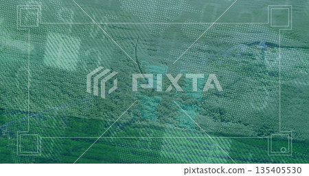 Displaying dense forest canopy over hills through HUD grid frame with blue contours, node markers Displaying dense forest canopy over hills through HUD grid frame with blue contours, node markers 135405530