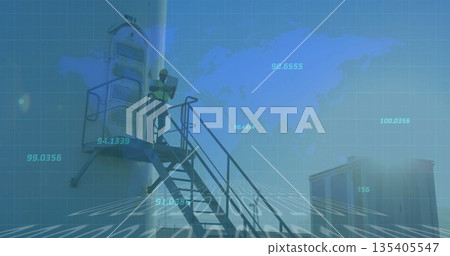 Inspecting NTU 5 tower, technician wearing safety vest and helmet on rooftop stairs with laptop 135405547