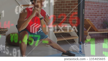Male athlete in sportswear performing side lunge stretch on mat at gym, showing financial overlays Male athlete in sportswear performing side lunge stretch on mat at gym, showing financial overlays 135405605