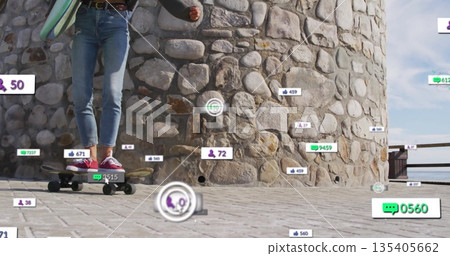Balancing longboard skateboarder on seaside walkway, holding surfboard and social media icons Balancing longboard skateboarder on seaside walkway, holding surfboard and social media icons 135405662