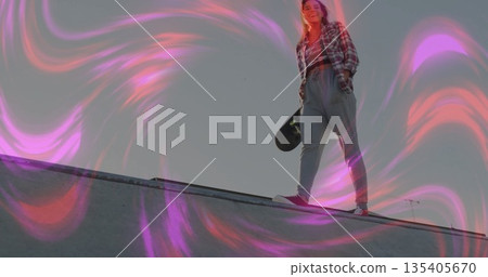 Standing skateboarder in flannel on skate park ramp with skateboard, digital swirls, copy space Standing skateboarder in flannel on skate park ramp with skateboard, digital swirls, copy space 135405670