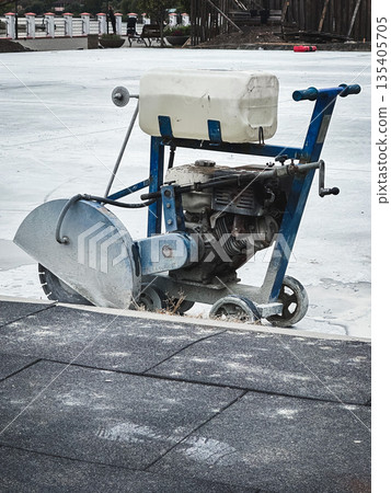 Concrete saw on a construction site Concrete saw on a construction site 135405705