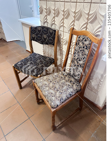 Two vintage wooden chairs with patterned upholstery Two vintage wooden chairs with patterned upholstery 135405706