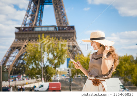 Solo Traveler Connects Digitally at Eiffel Tower 135406025