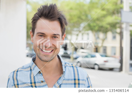 Middle-aged man standing smiling on city street wearing shirt amid parked cars trees white column Middle-aged man standing smiling on city street wearing shirt amid parked cars trees white column 135406514
