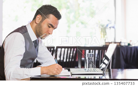 man, writing, laptop 135407733