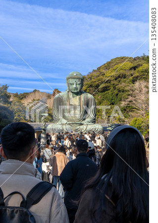 The Great Buddha of Kamakura and two people The Great Buddha of Kamakura and two people 135408083