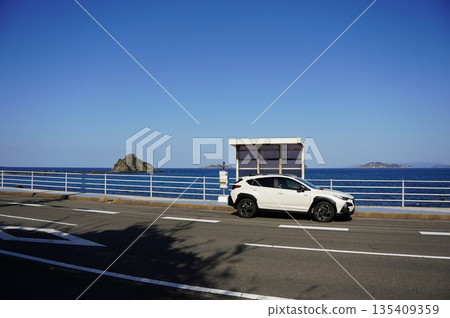 car running on the road by the sea car running on the road by the sea 135409359