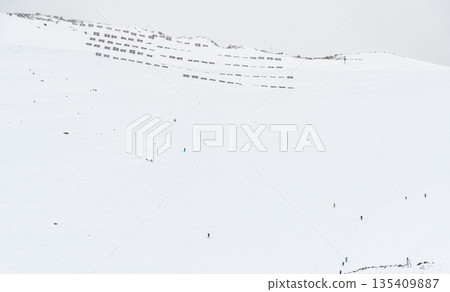 The cable car with ski tourist at Skalnate Pleso mountain, Slovakia Hight Tatras. The cable car with ski tourist at Skalnate Pleso mountain, Slovakia Hight Tatras. 135409887