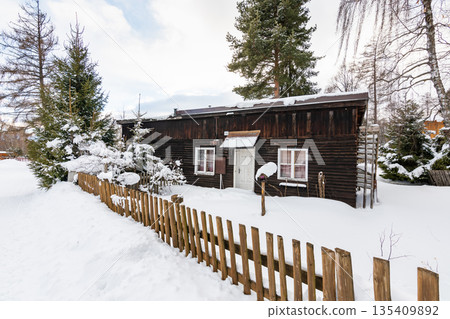 Small houses covered with snow in winter at Slovakia High Tatras mountains. Winter weather. Small houses covered with snow in winter at Slovakia High Tatras mountains. Winter weather. 135409892